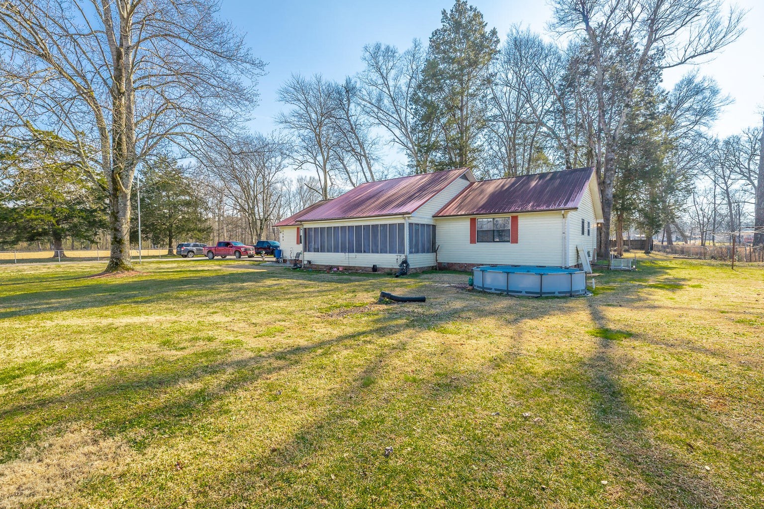 2582 East Valley Road Jasper, TN 37347 - Photo 7 of 17 a front view of house with yard and trees in the background