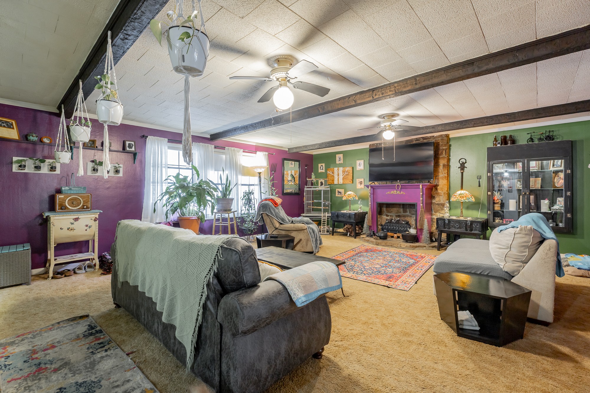 2582 East Valley Road Jasper, TN 37347 - Photo 8 of 17 a living room with furniture a chandelier and a fireplace