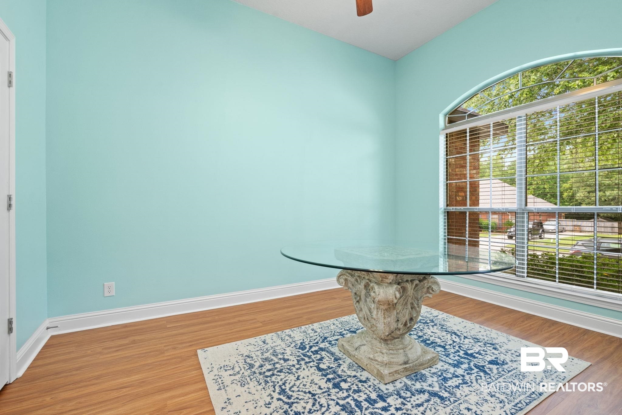 2554 Masters Court Mobile, AL 36618 - Photo 30 of 35 Unfurnished dining area featuring light wood-style floors and a ceiling fan