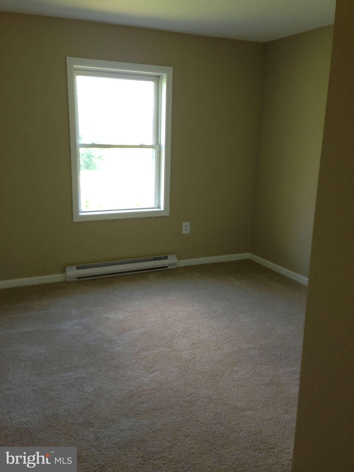 12129 Houck Road Union Bridge, MD 21791 - Photo 6 of 12 an empty room with a window