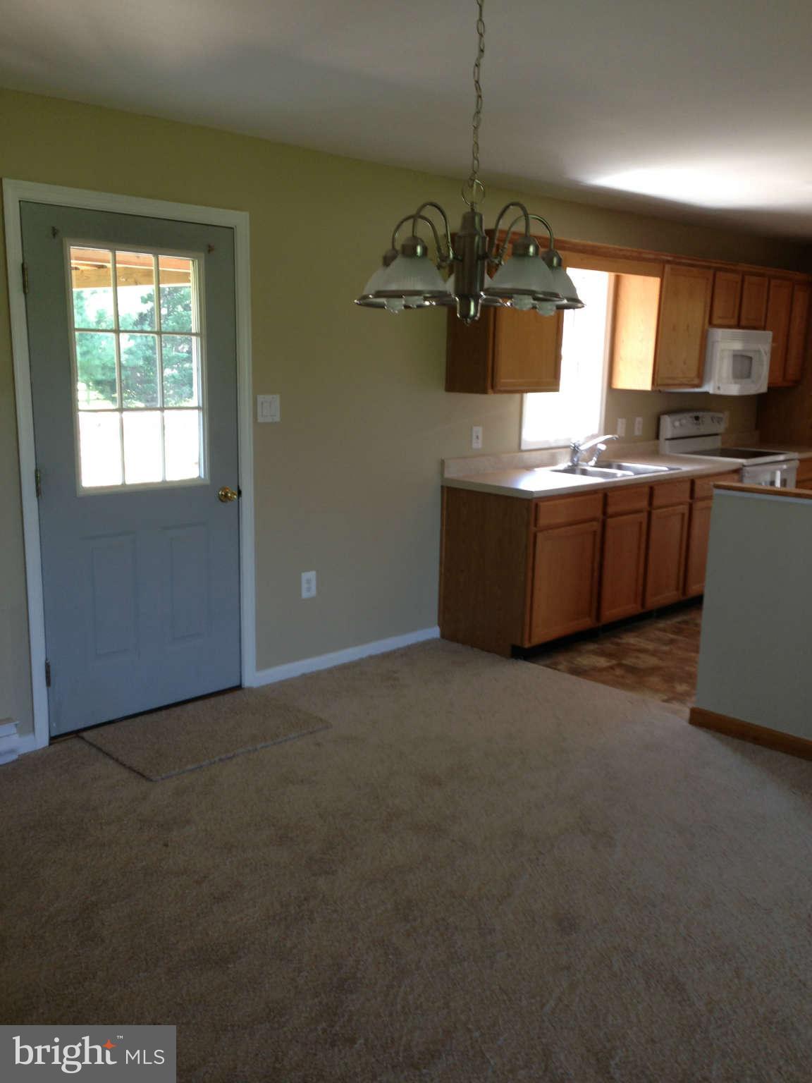 12129 Houck Road Union Bridge, MD 21791 - Photo 7 of 12 a view of a kitchen with a sink