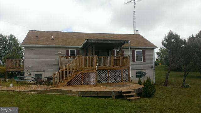 12129 Houck Road Union Bridge, MD 21791 - Photo 10 of 12 a front view of a house with garden