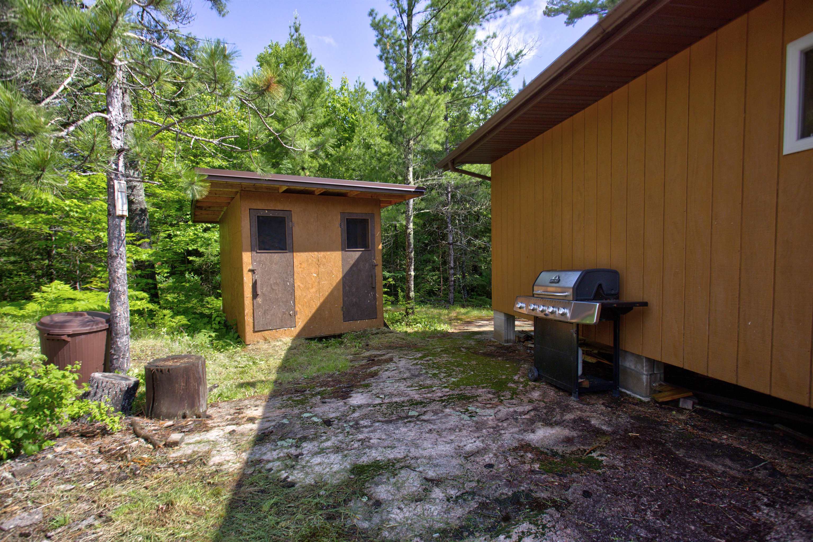 4194 Nels Lake Road Ely, MN 55731 - Photo 2 of 27 View of yard with a storage shed