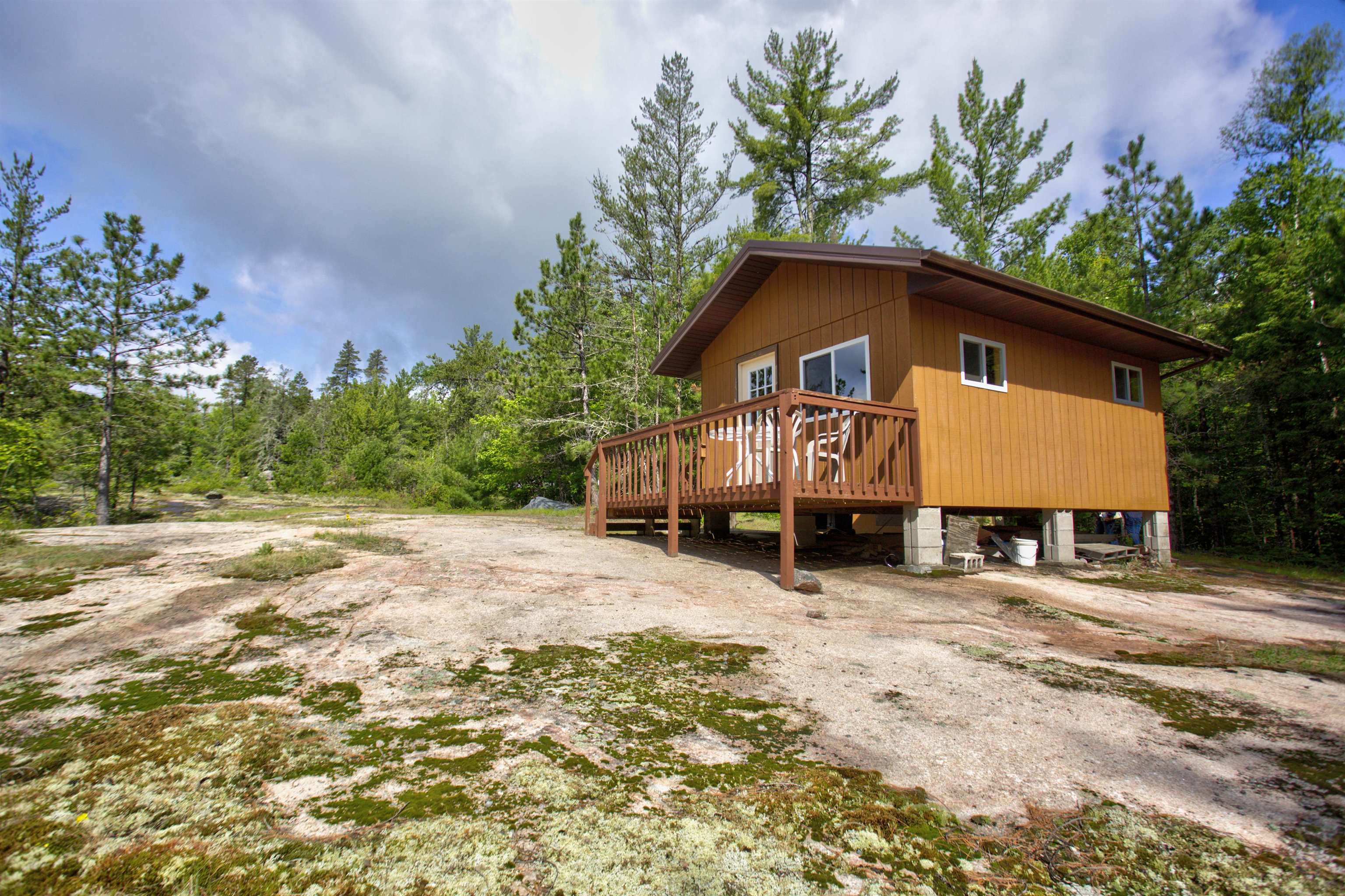 4194 Nels Lake Road Ely, MN 55731 - Photo 6 of 27 View of side of home with a deck