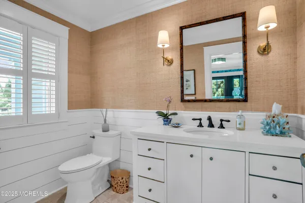 a view of staircase with wooden floor and window