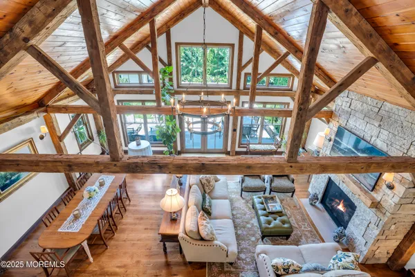 a view of a patio with table and chairs and potted plants