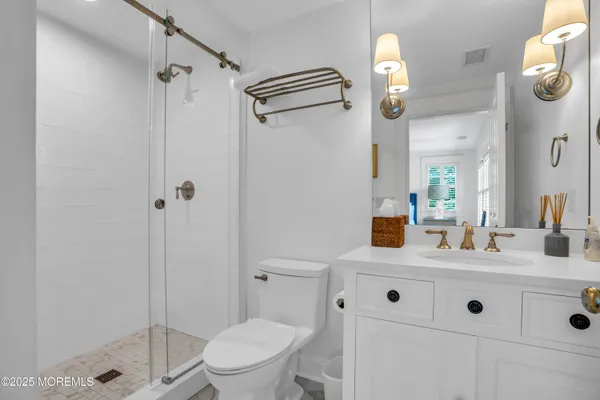 an aerial view of multiple houses with yard