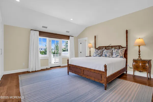 a bathroom with a sink vanity and mirror