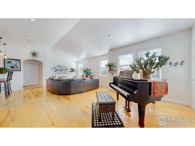 a living room with furniture and a couch