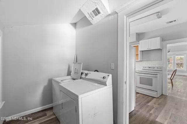 a utility room with dryer and washer