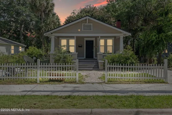 a front view of a house with a porch