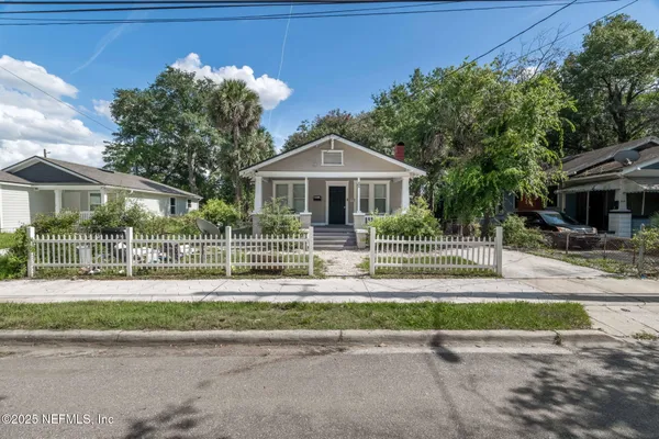 a front view of a house with a porch