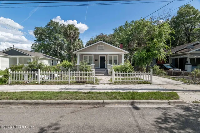 a front view of a house with a porch