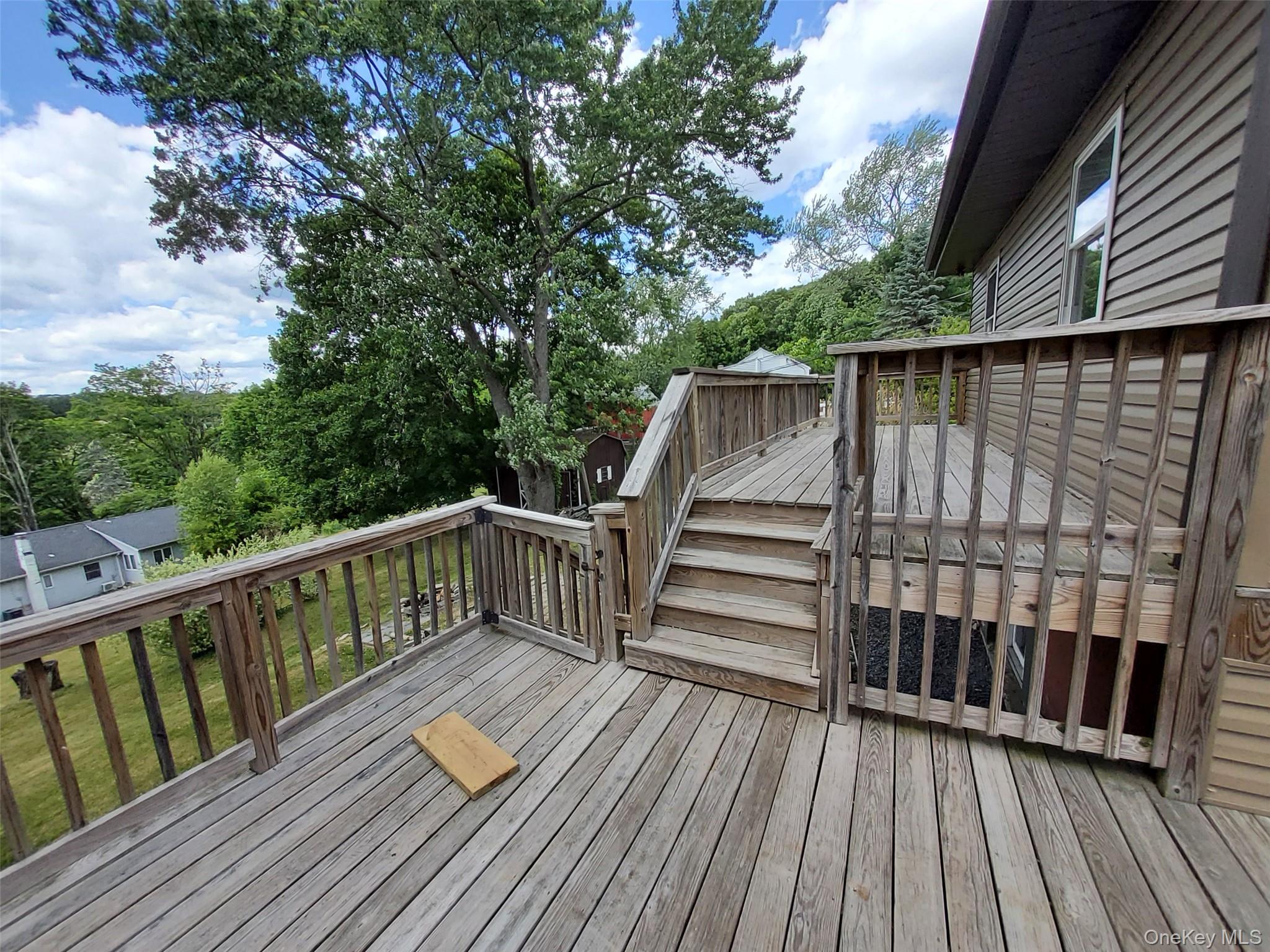 469 Hillside Road Monroe, NY 10950 - Photo 15 of 20 a view of balcony with wooden floor and fence