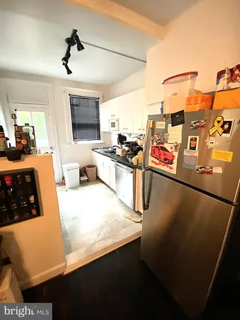 a view of a living room and dining room