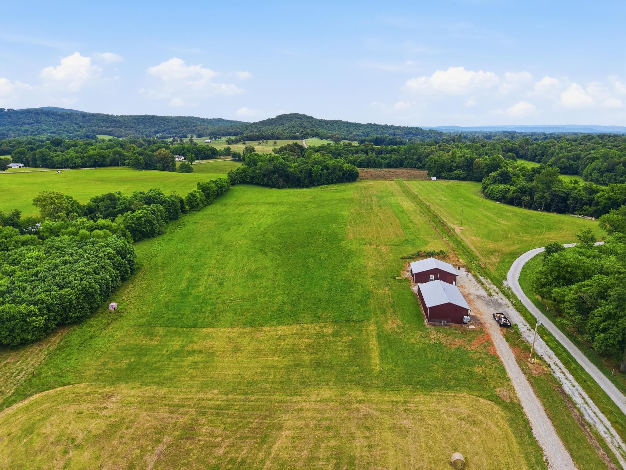 1050 Franks Ferry Road Sparta, TN 38583 - Photo 20 of 35 a view of a lake with a yard