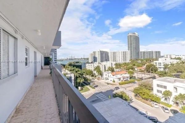 a view of balcony with patio