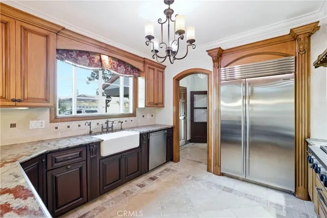 a dining room with a table and chairs