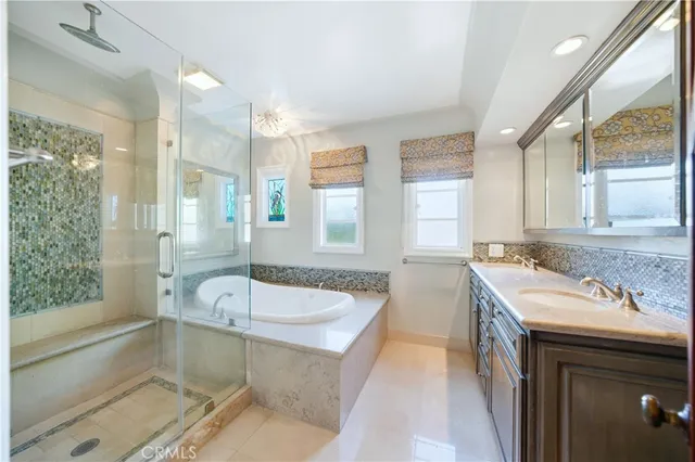 a view of an empty room with windows