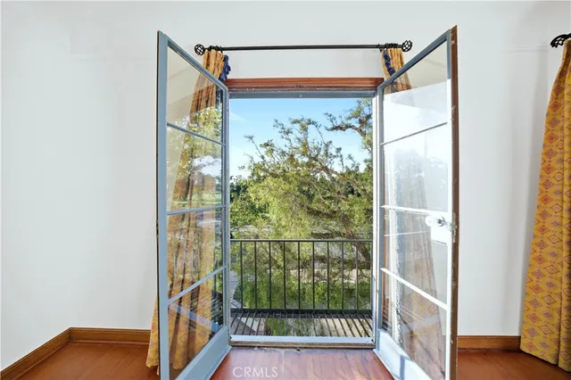 a bathroom with a mirror sink vanity and tub