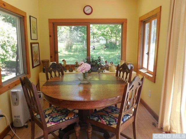 277 Birch Hill Road Copake, NY 12521 - Photo 12 of 19 a dining room with furniture and window