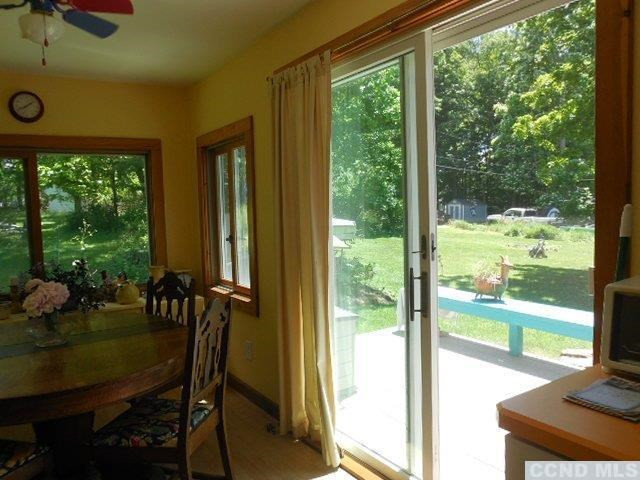 277 Birch Hill Road Copake, NY 12521 - Photo 14 of 19 a view of a dining room with furniture window and outside view