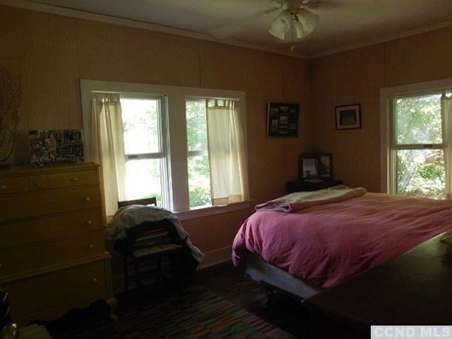 277 Birch Hill Road Copake, NY 12521 - Photo 15 of 19 a bedroom with a bed and a window