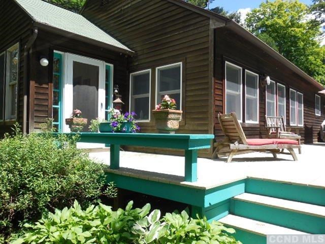 277 Birch Hill Road Copake, NY 12521 - Photo 3 of 19 a front view of a house with garden