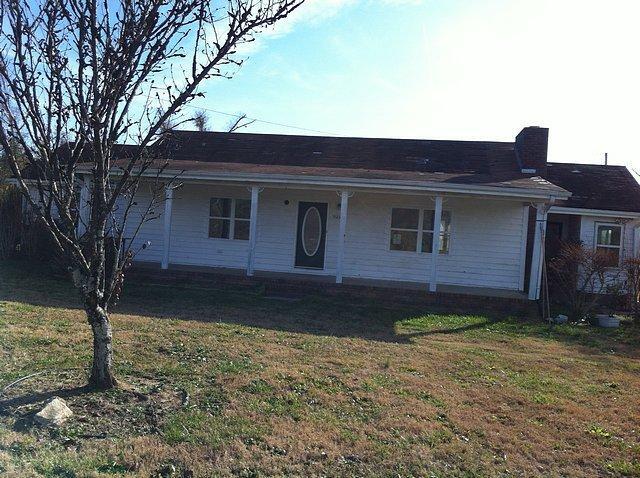 923 Steele Road Griffin, GA 30223 - Photo 1 of 1 a view of a house with a yard