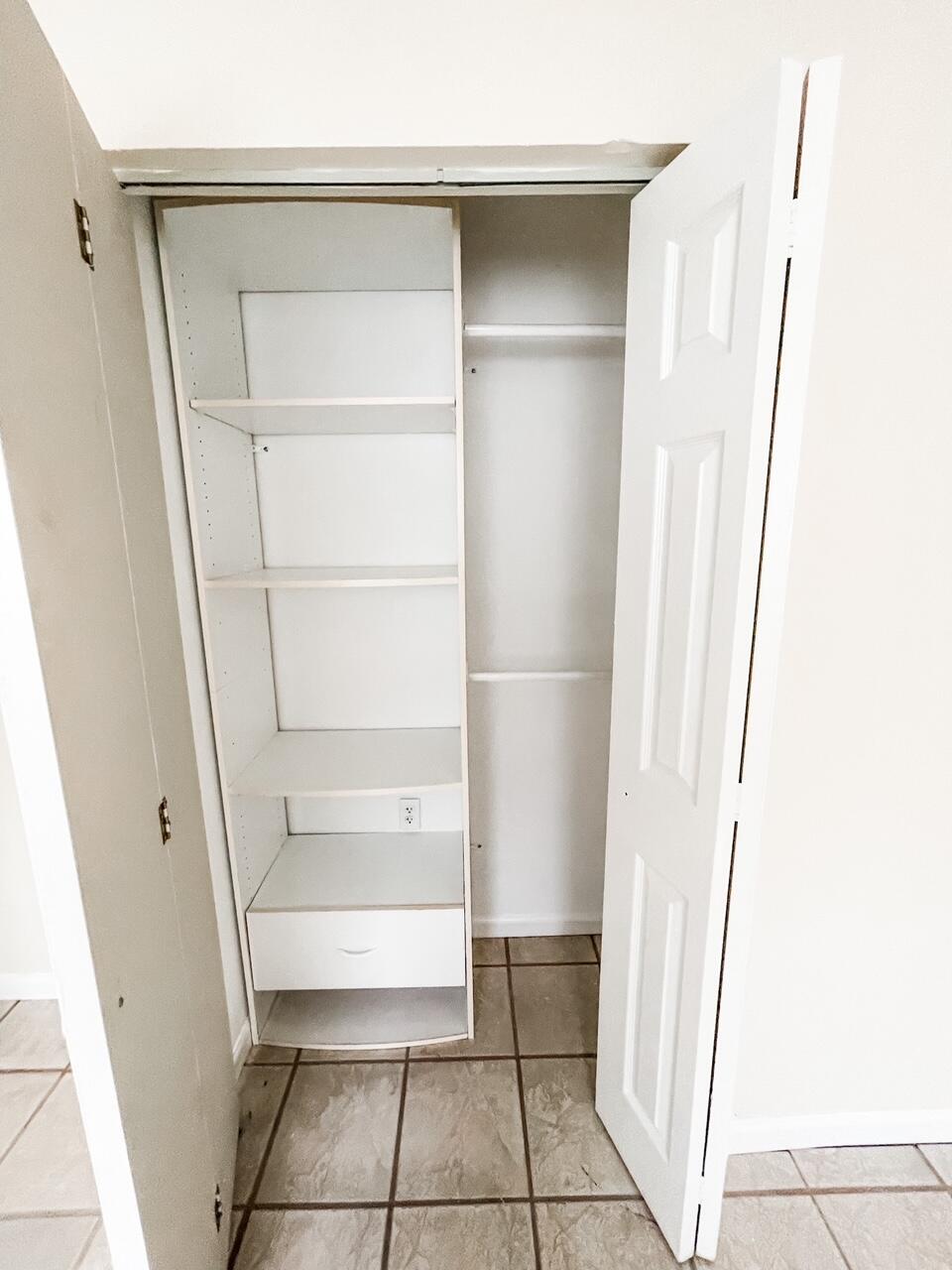 2213 2nd Street Southwest Vero Beach, FL 32962 - Photo 15 of 18 a view of walk in closet with empty racks
