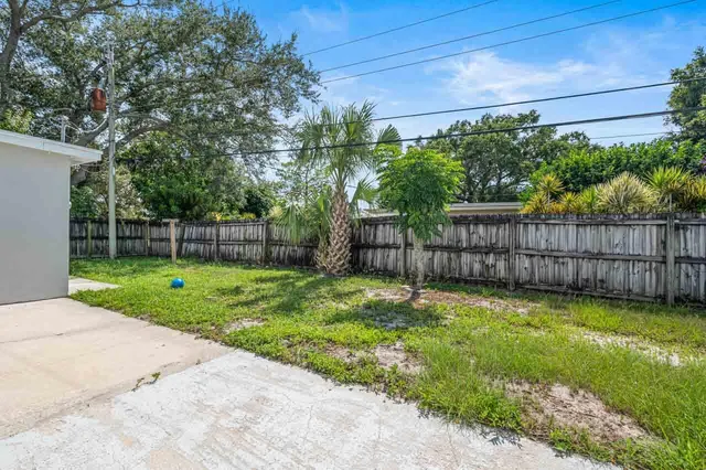 a view of a backyard with a garden