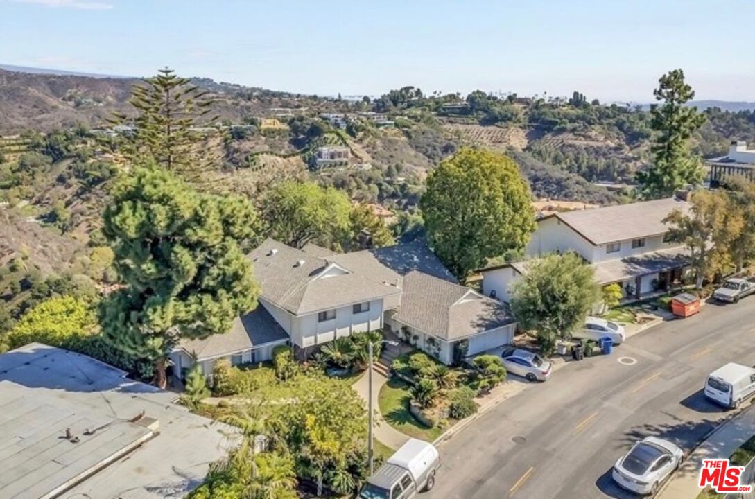 1342 Stradella Road Los Angeles, CA 90077 - Photo 18 of 24 an aerial view of a house with a garden