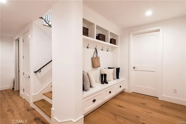a view of a livingroom with wooden floor