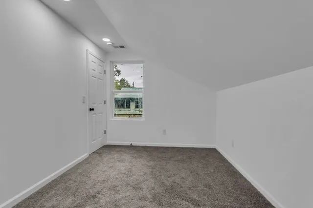 a bathroom with a bathtub and a sink