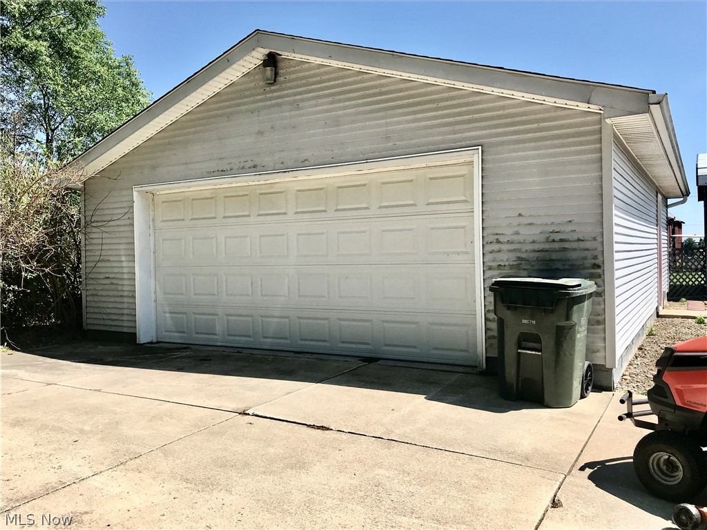 8868 Nichols Road Windham, OH 44288 - Photo 18 of 22 Oversized garage -extra storage in the garage 32 x 24.