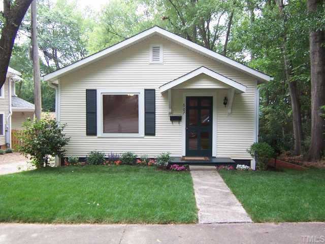 607 Adams Street Raleigh, NC 27605 - Photo 1 of 9 a front view of a house with a garden