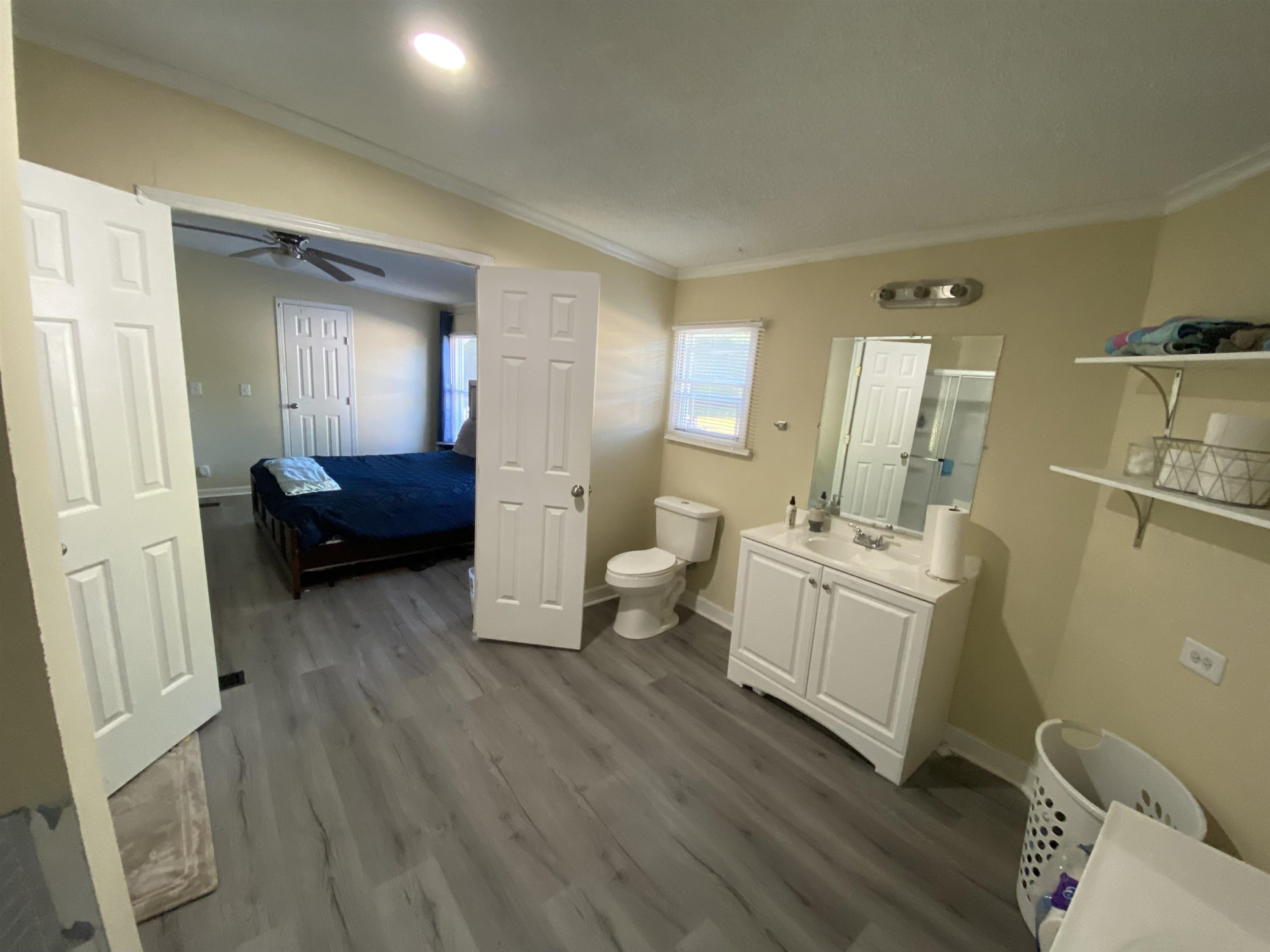 6036 Rock Quarry Road Raleigh, NC 27610 - Photo 15 of 17 a living room with furniture and a wooden floor