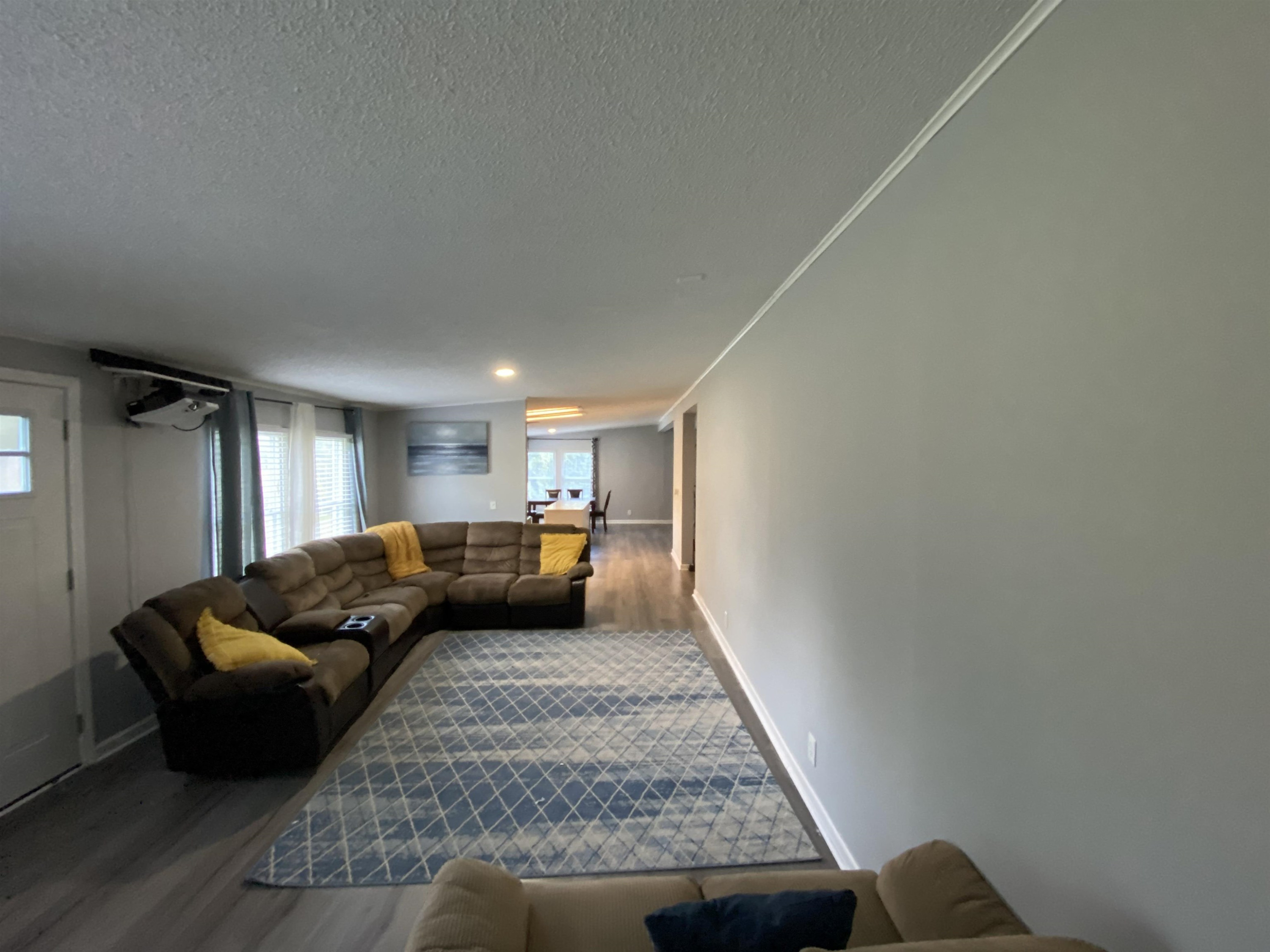 6036 Rock Quarry Road Raleigh, NC 27610 - Photo 5 of 17 a living room with furniture and a couch