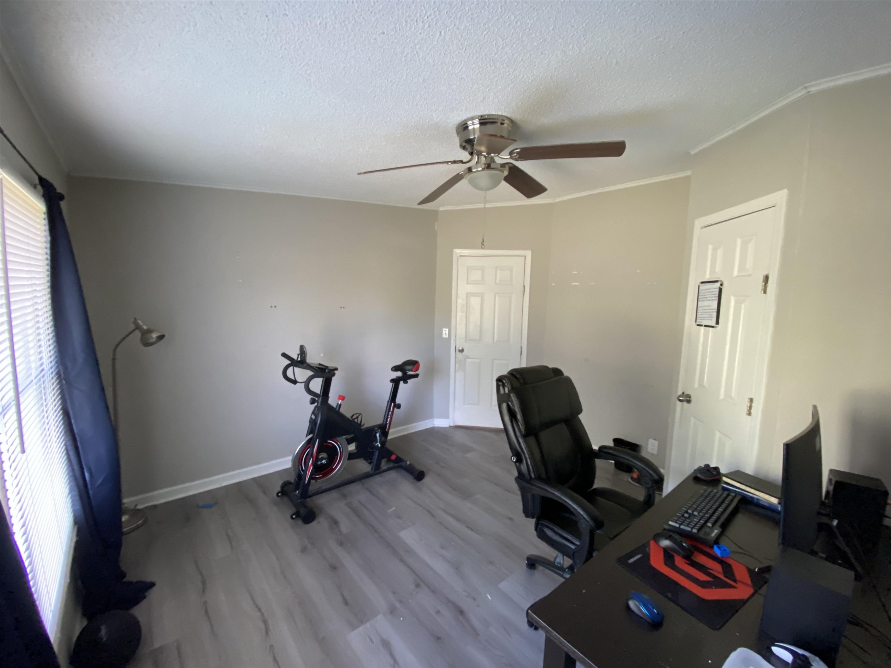 6036 Rock Quarry Road Raleigh, NC 27610 - Photo 6 of 17 a room with furniture and wooden floor