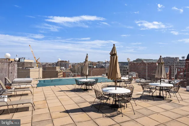 a view of a terrace with furniture