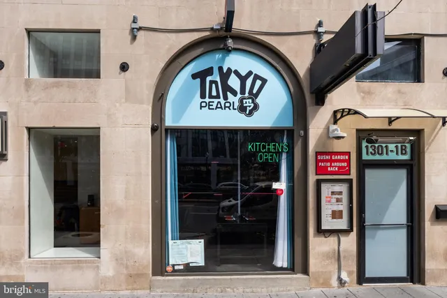 a view of street with sitting area