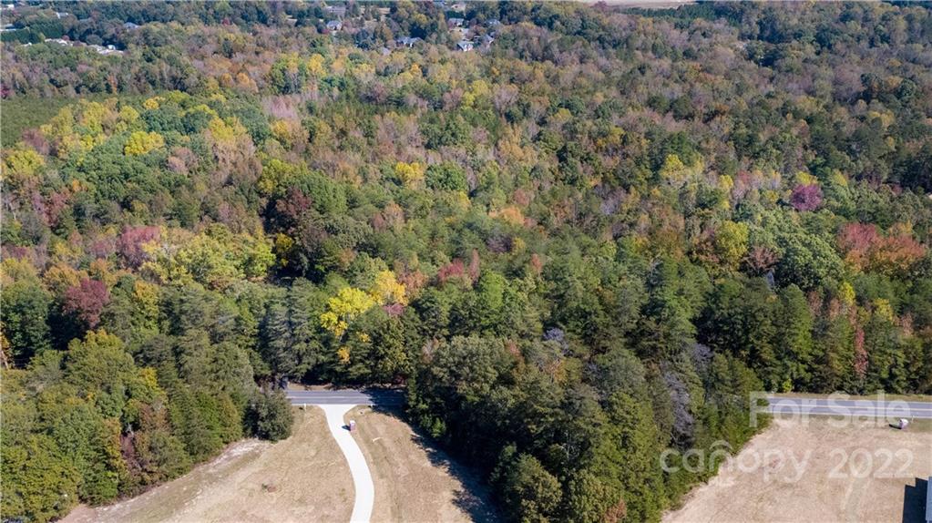 377 Meek Road, Unit 4 Gastonia, NC 28056 - Photo 4 of 33 a view of a wooden bridge