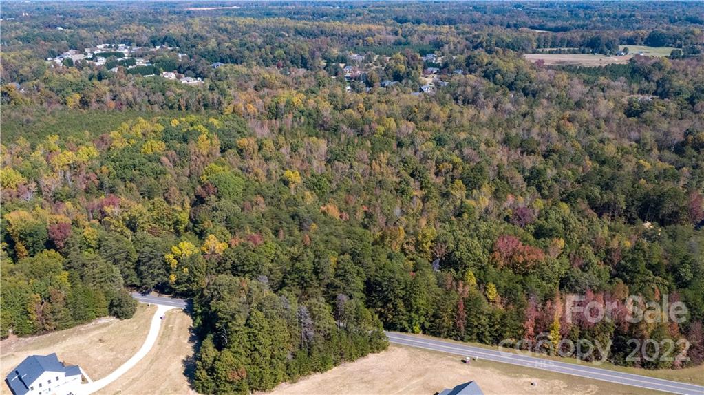 377 Meek Road, Unit 4 Gastonia, NC 28056 - Photo 8 of 33 an aerial view of a house with a yard