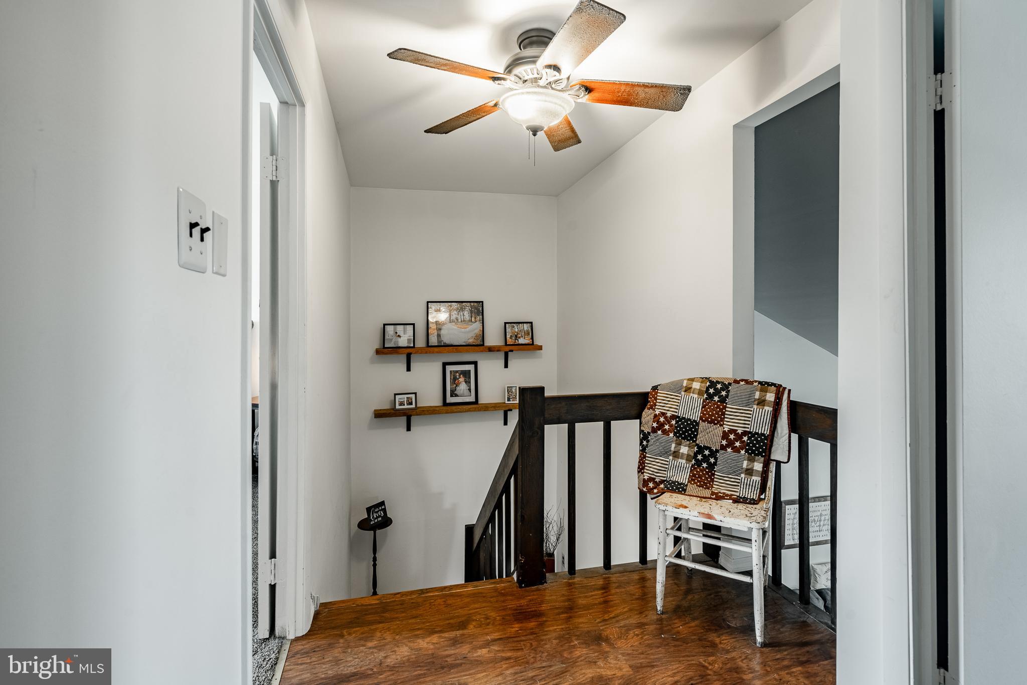 32-4 Wister Way Reading, PA 19606 - Photo 17 of 47 a view of a hallway with workspace and wooden floor