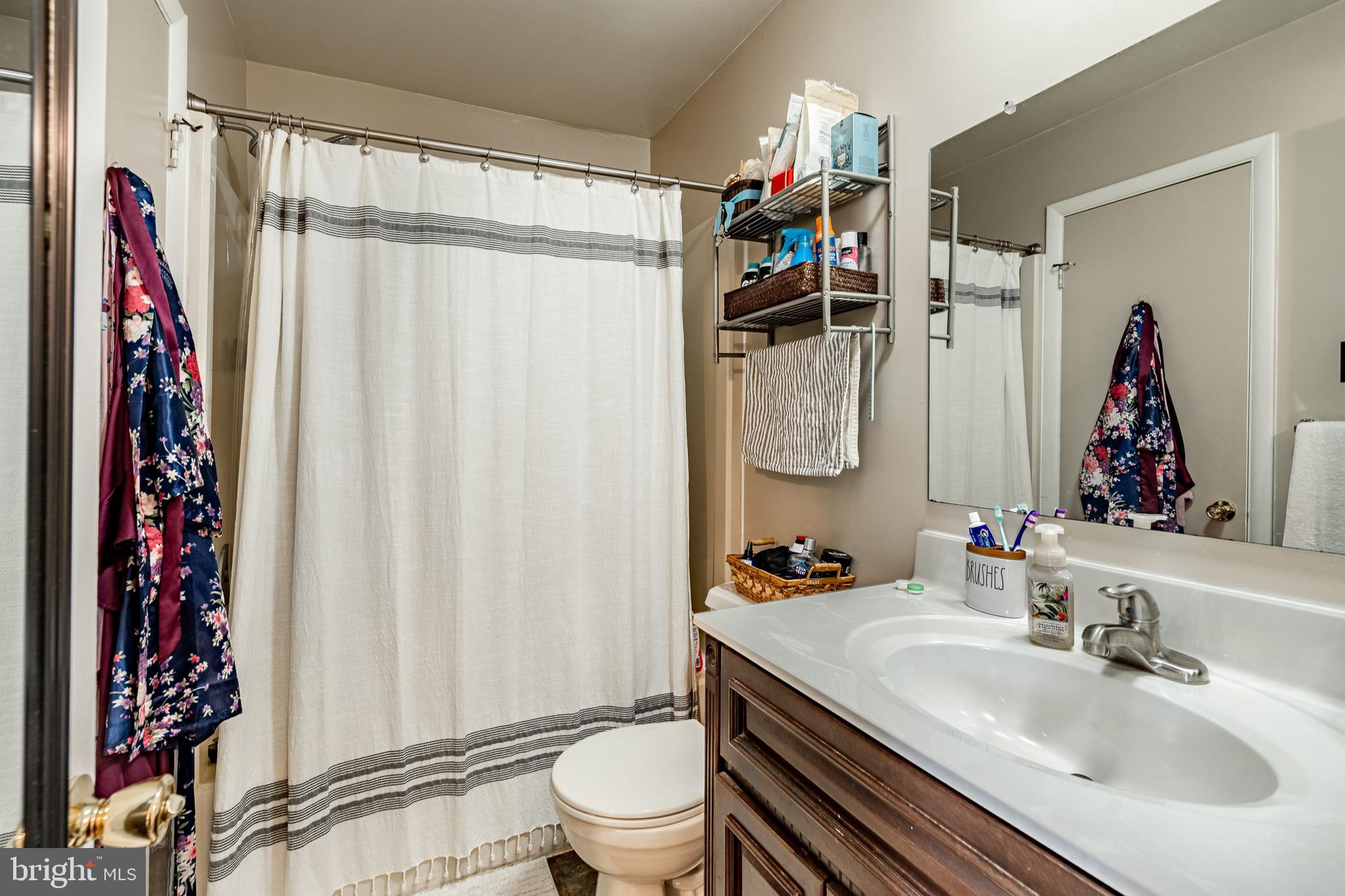 32-4 Wister Way Reading, PA 19606 - Photo 23 of 47 a bathroom with a sink toilet and shower