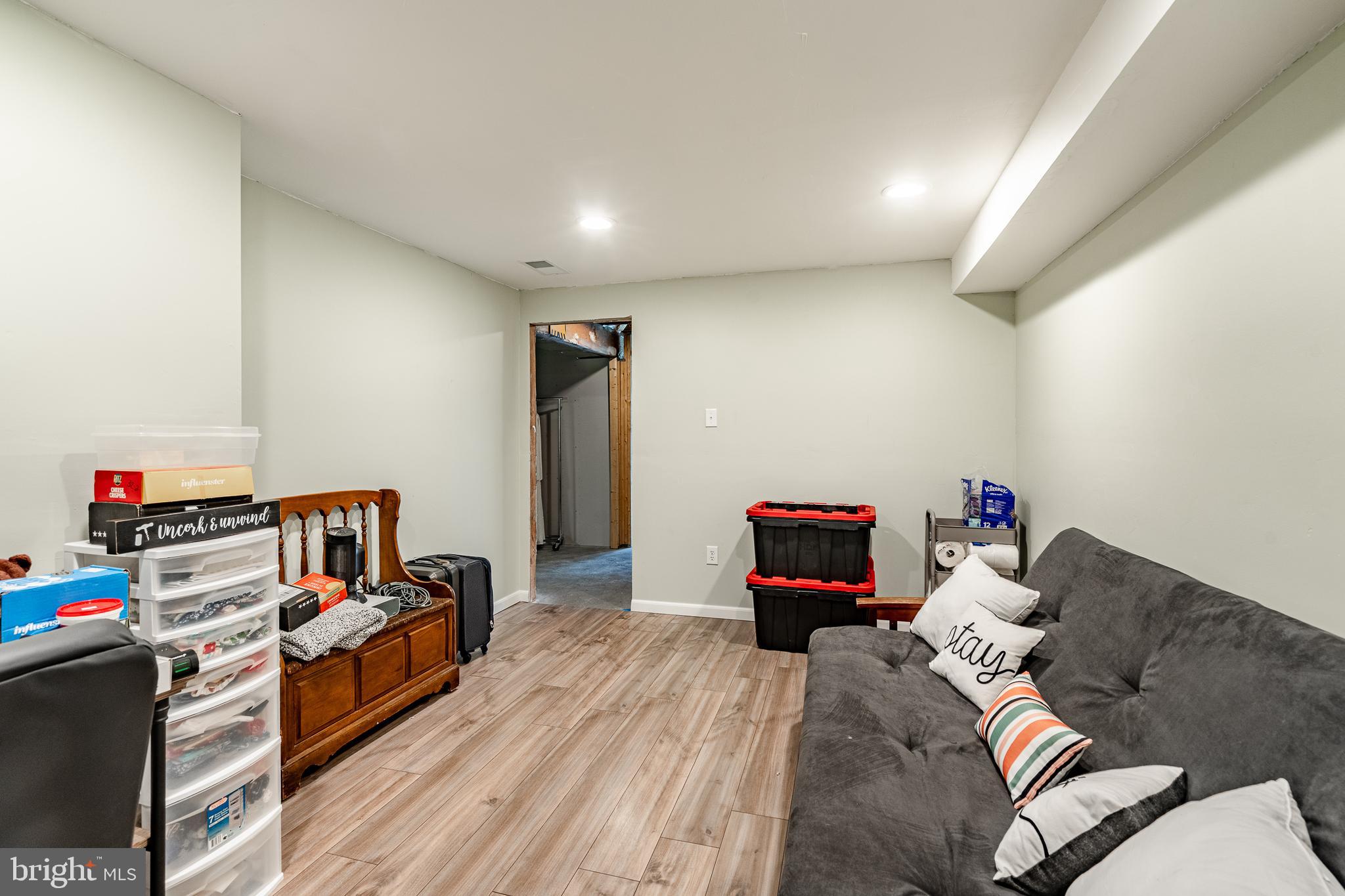 32-4 Wister Way Reading, PA 19606 - Photo 27 of 47 a bedroom with furniture and a wooden floor
