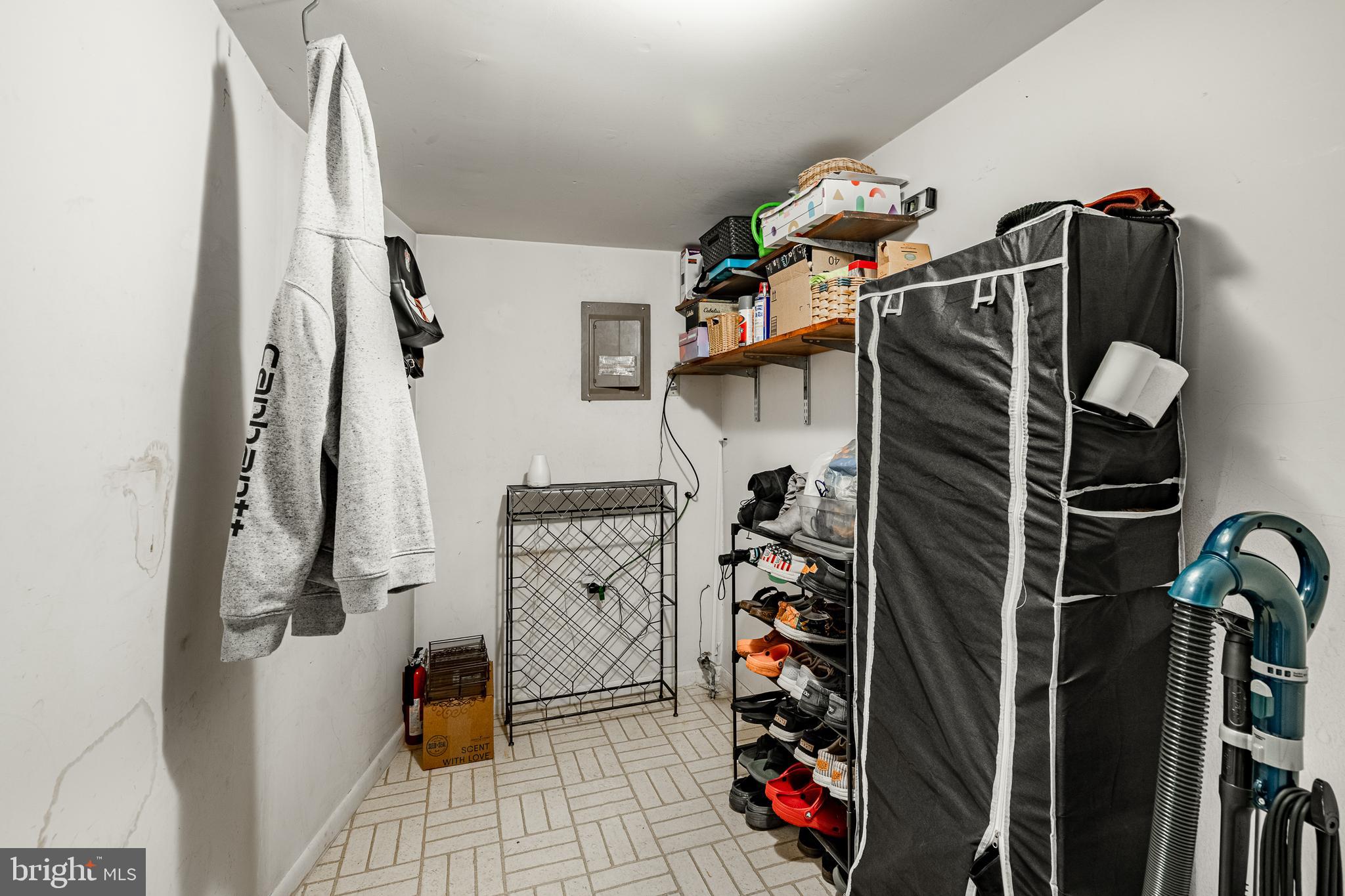 32-4 Wister Way Reading, PA 19606 - Photo 29 of 47 a view of walk in closet with clothes and shoes