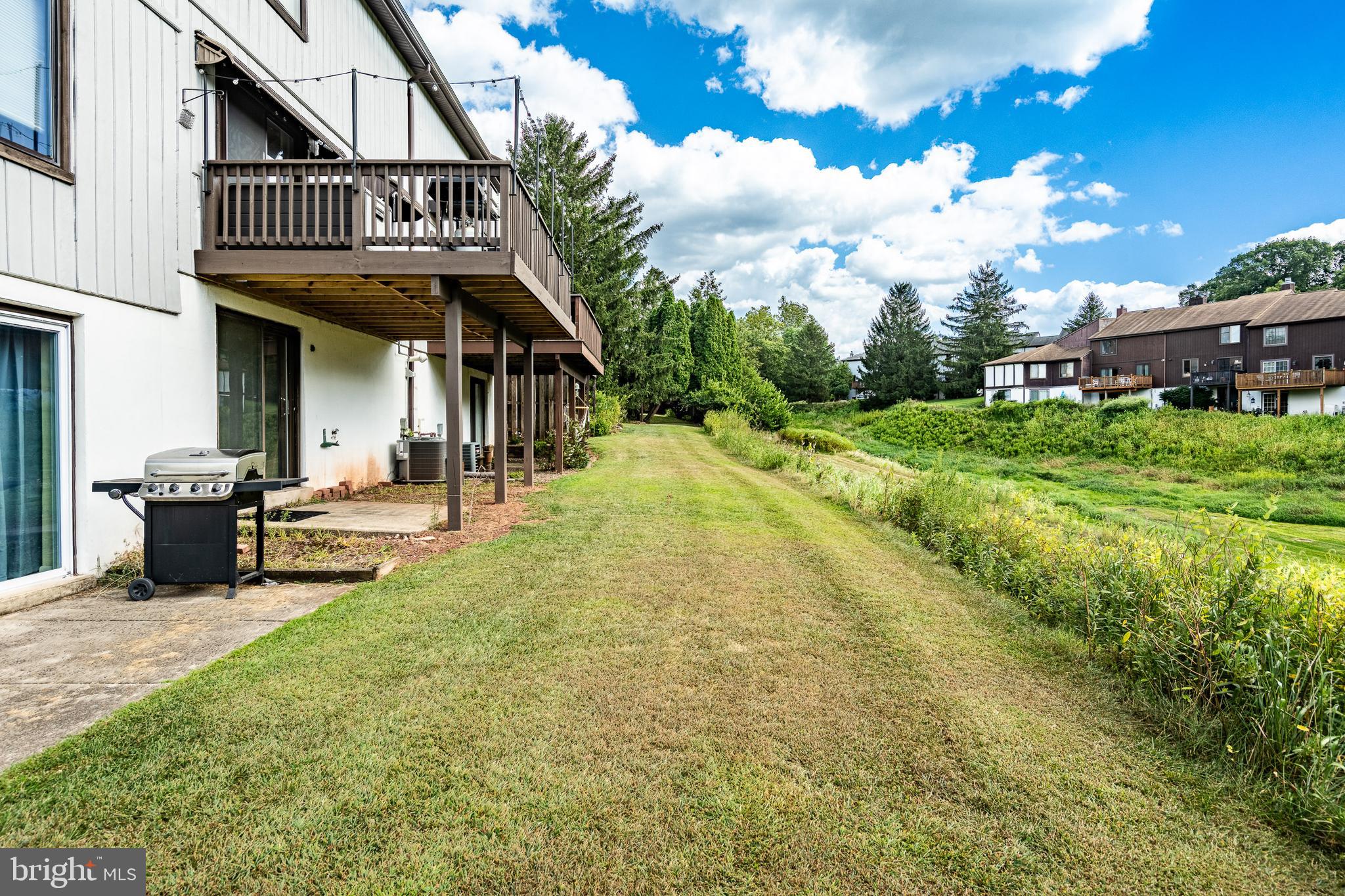 32-4 Wister Way Reading, PA 19606 - Photo 35 of 47 a view of a house with a yard
