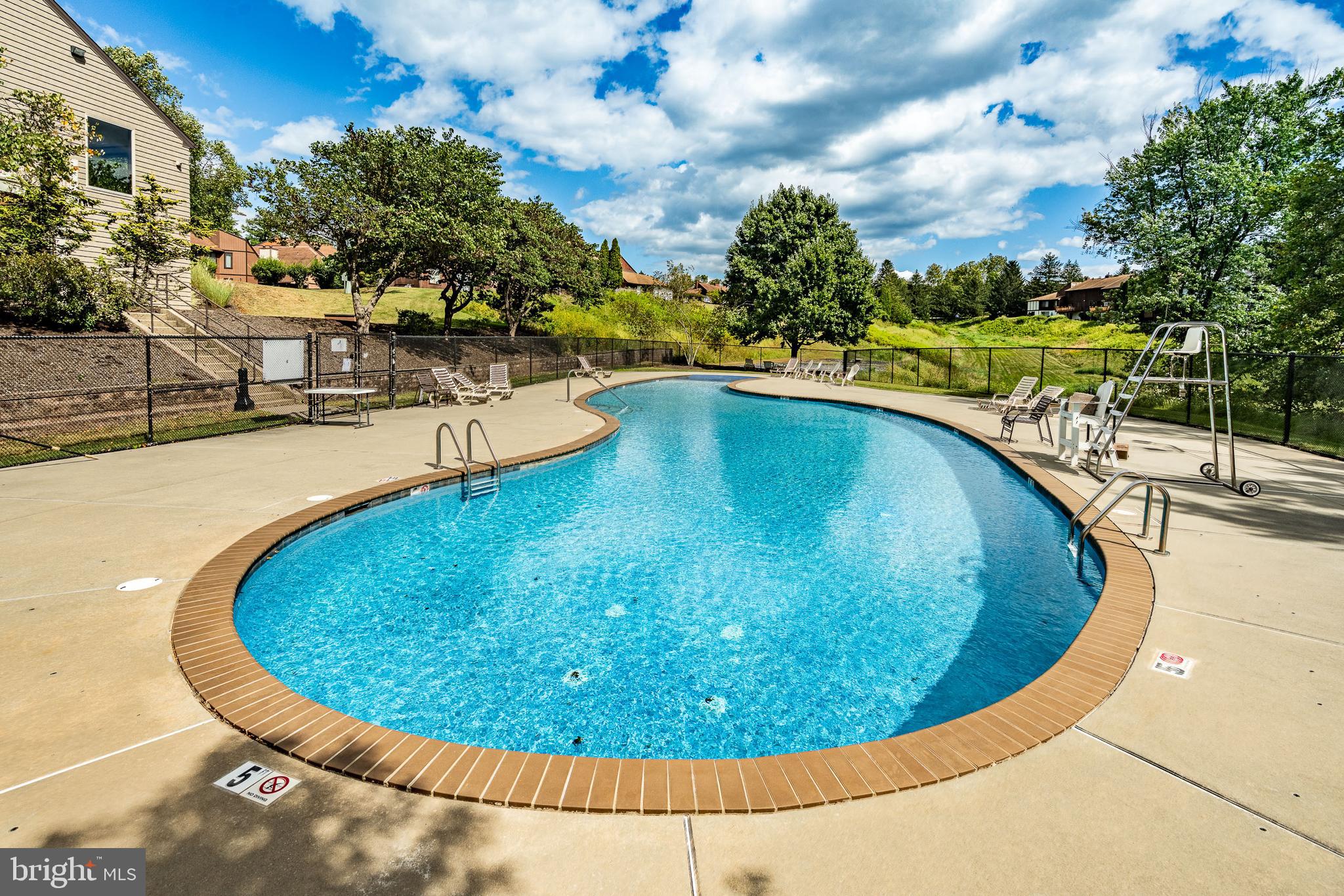 32-4 Wister Way Reading, PA 19606 - Photo 45 of 47 a view of a swimming pool with a yard