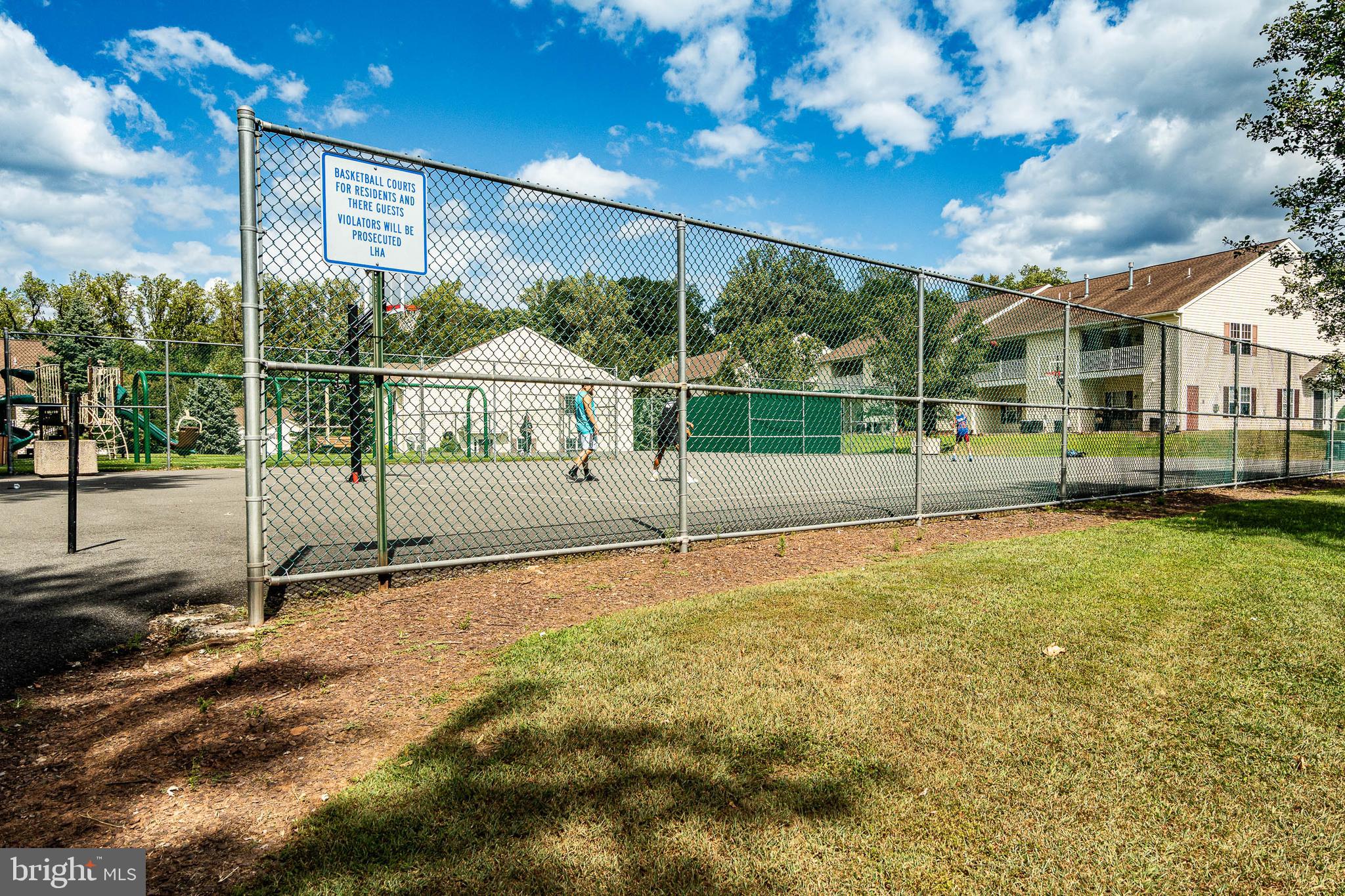 32-4 Wister Way Reading, PA 19606 - Photo 46 of 47 a view of an house with backyard and a tree
